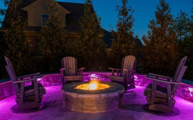 Patios, decks, and hardscaping — transform backyards into evening retreats