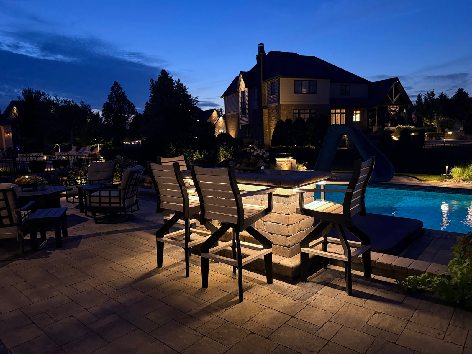 Outdoor poolside linear LED accent lighting installation