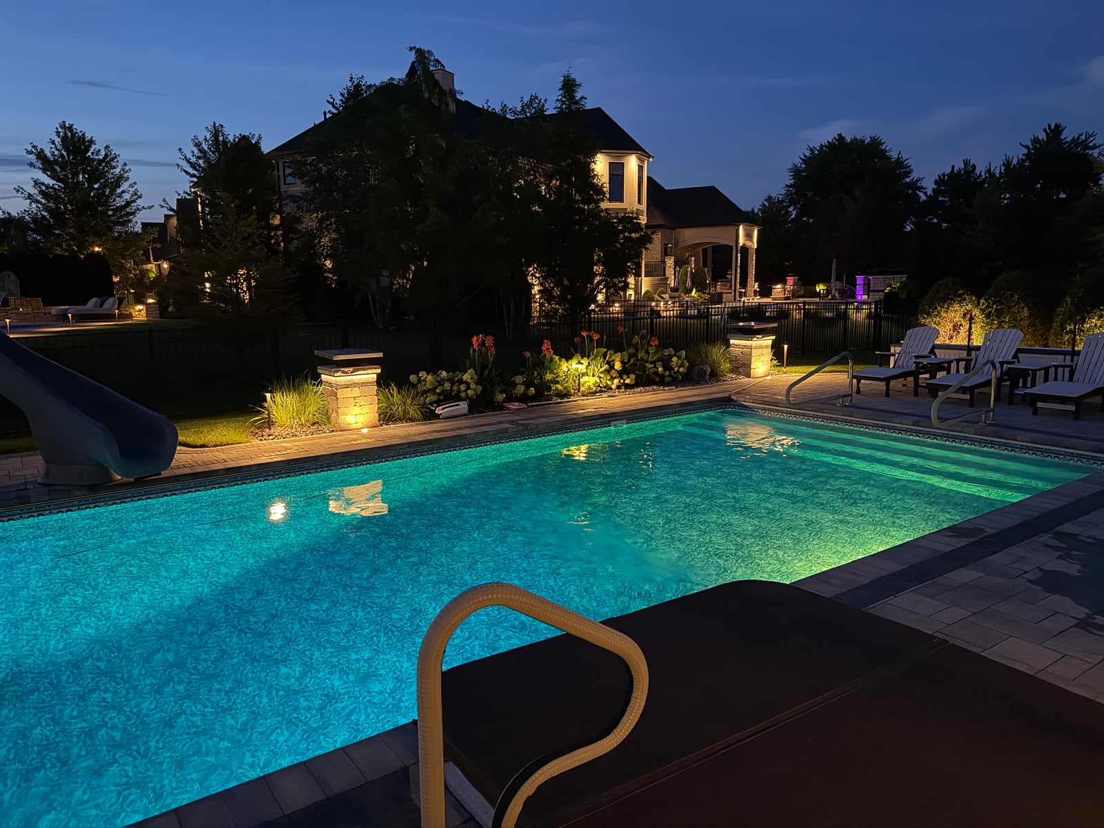 Outdoor poolside linear LED accent lighting installation